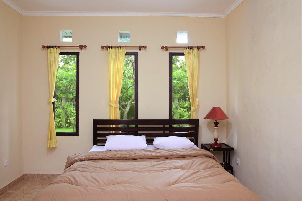 Cinthya Guest House Legian Rum bild
